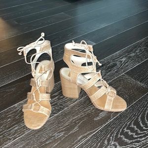 Beige weaved lace up sandals by Dolce Vita